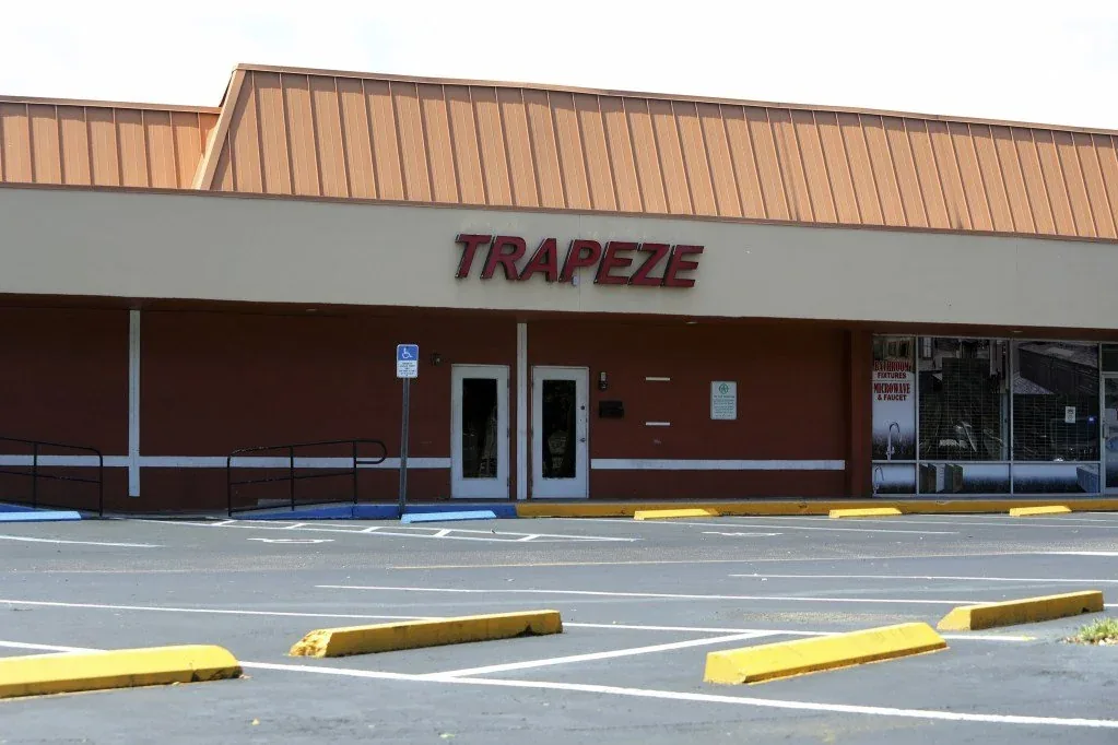 The Trapeze club storefront in a Tamarac, Florida strip mall